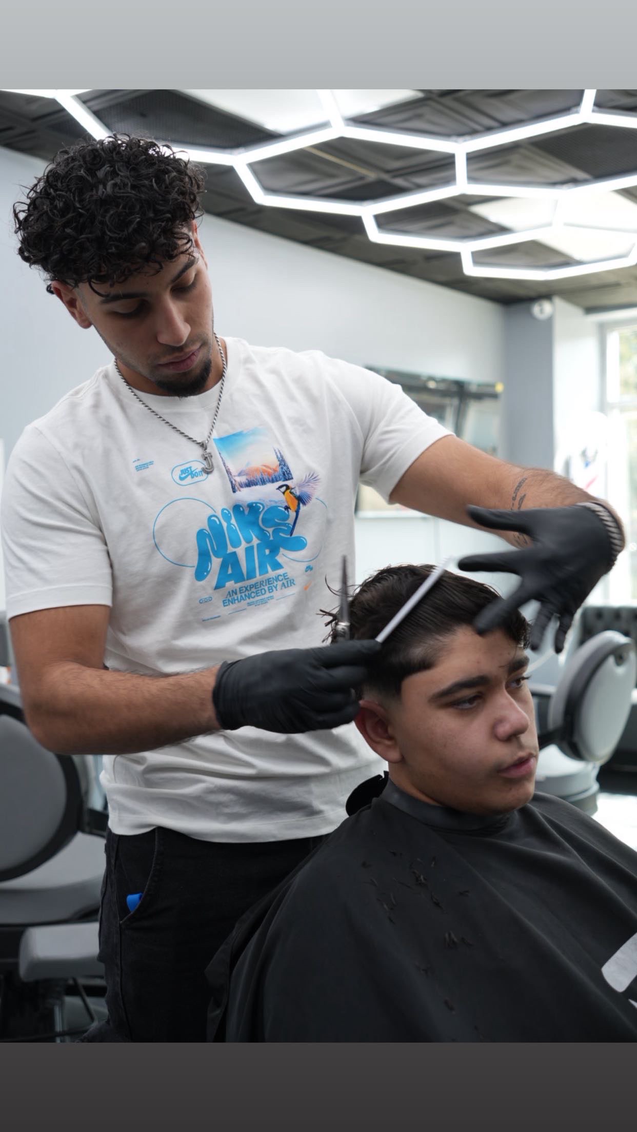 Barber Jay at work